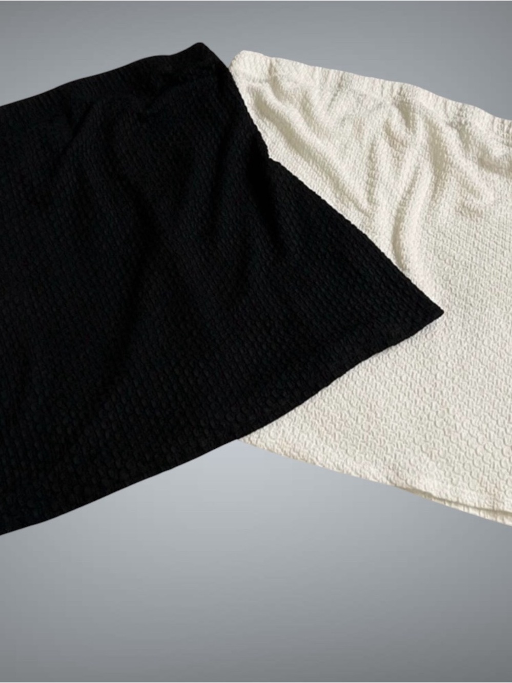 Like Love tube tanks in black and white.  Selling both together.